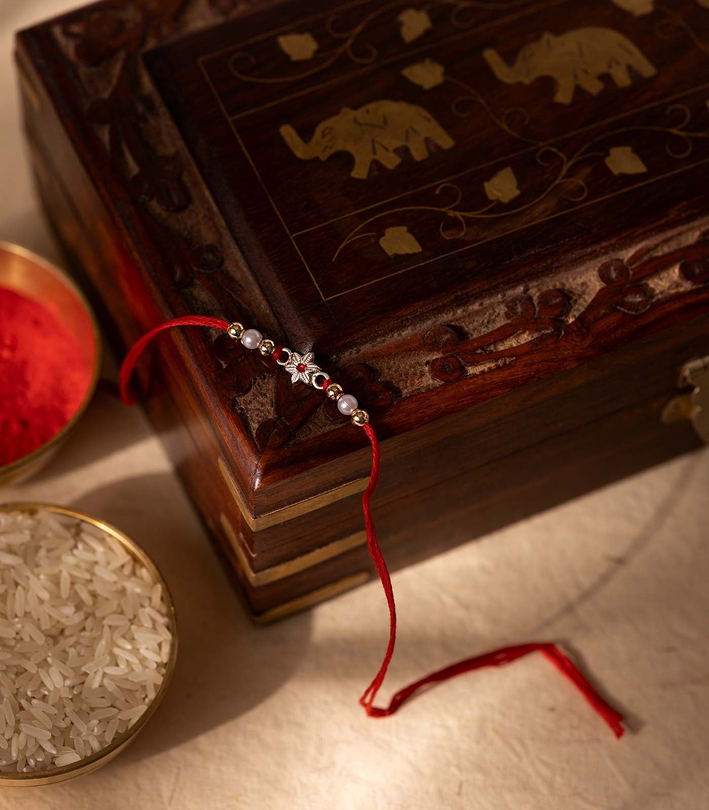 Stunning Silver Rakhi - The Elegant Floral Design