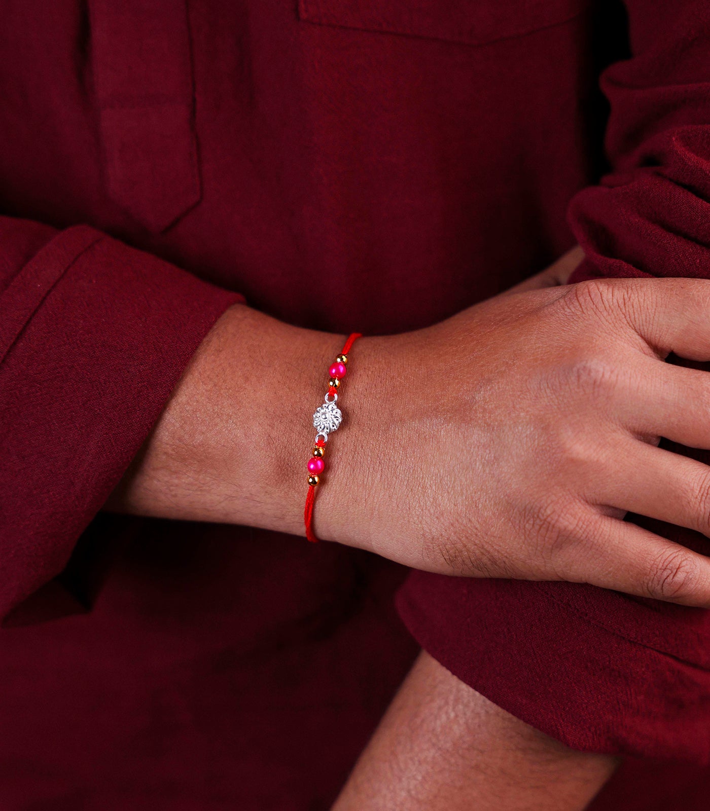 Silver Rakhi - The delicate petal motif design