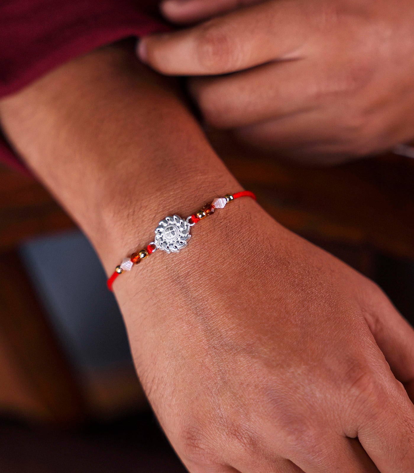 Stunning Silver Rakhi - Chakra Design