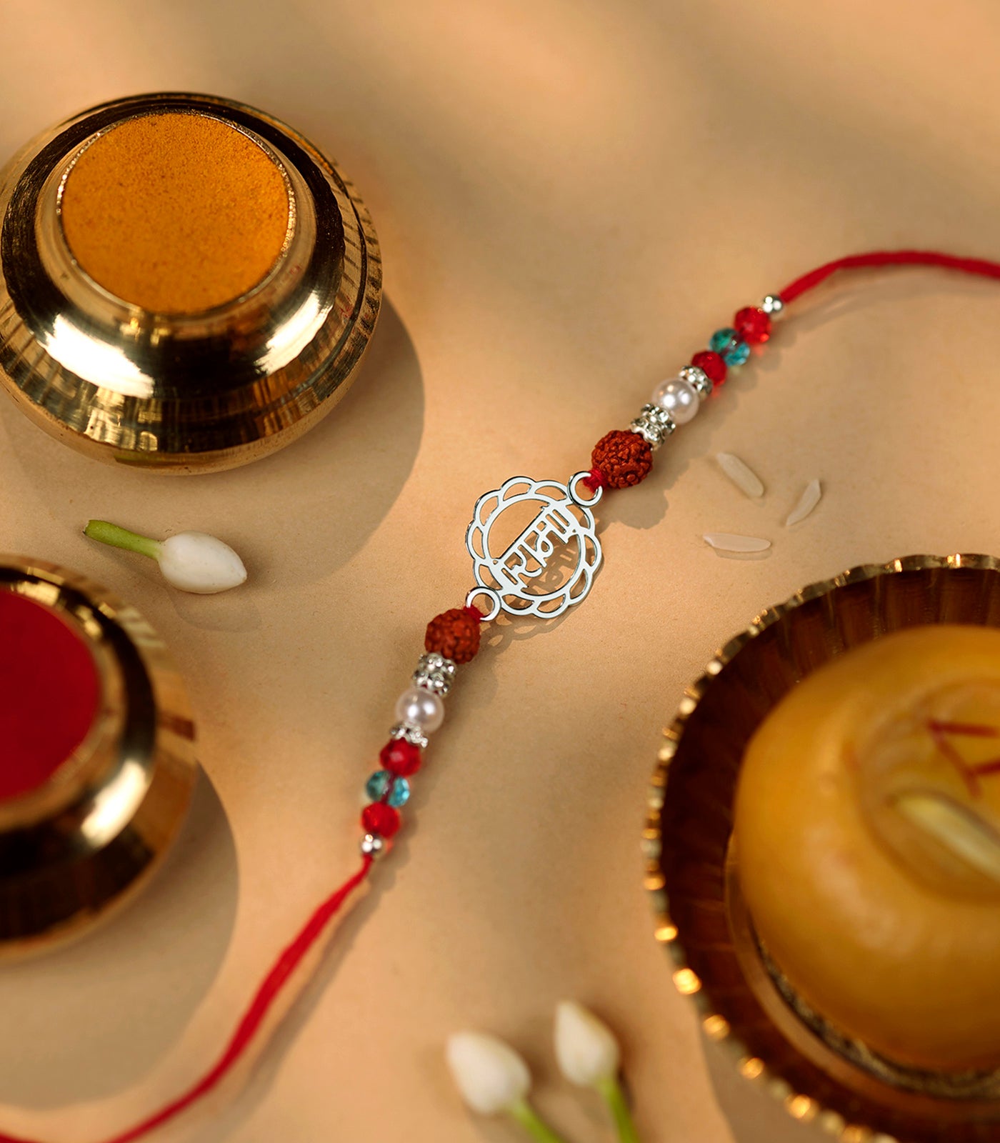 Silver Rudraksh Rakhi - Ram text Design