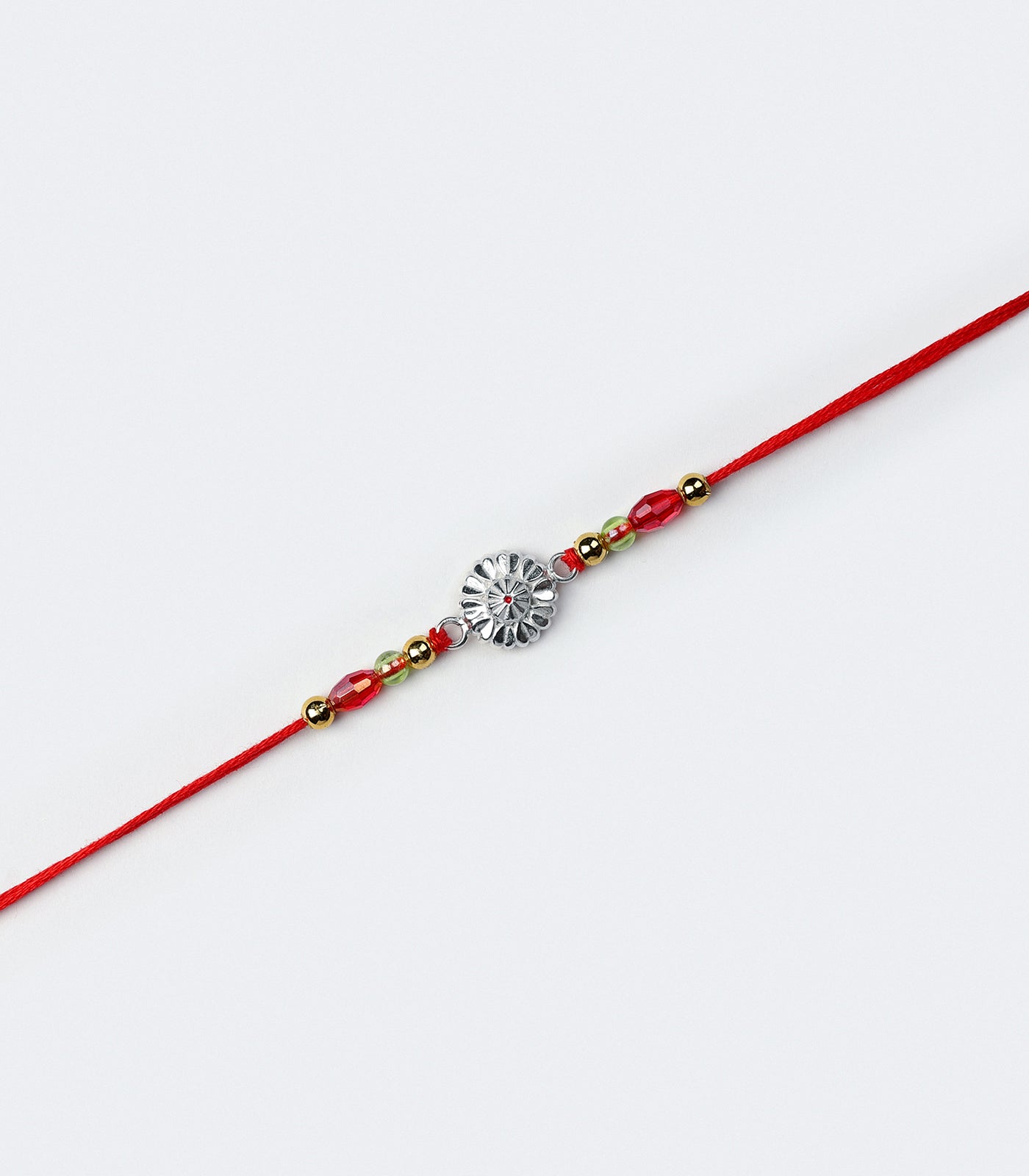 Elegant Petal Motif Silver Rakhi