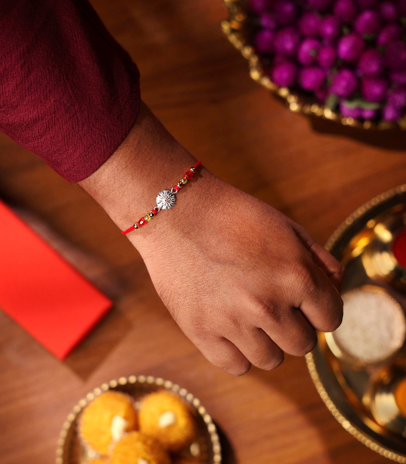Elegant Petal Motif Silver Rakhi