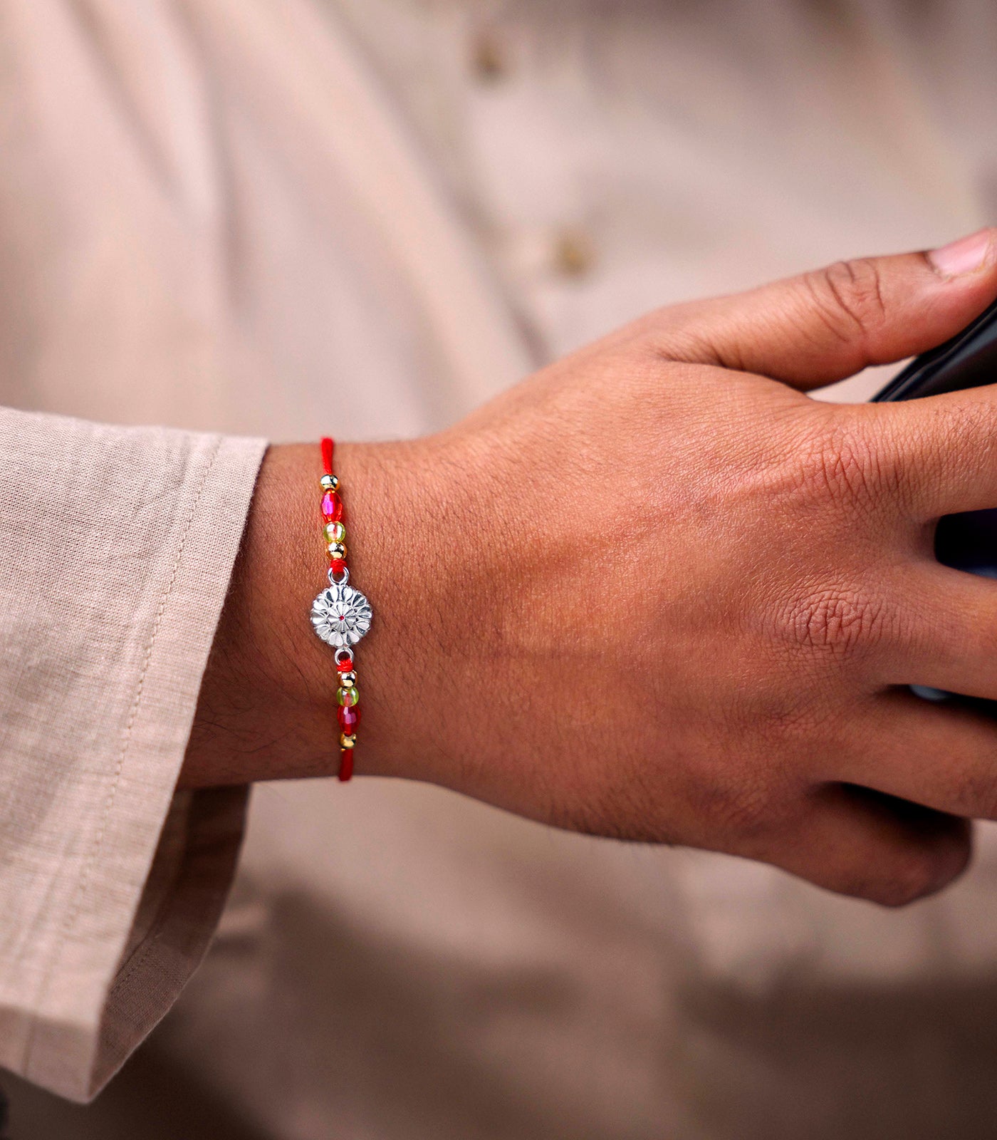 Elegant Petal Motif Silver Rakhi