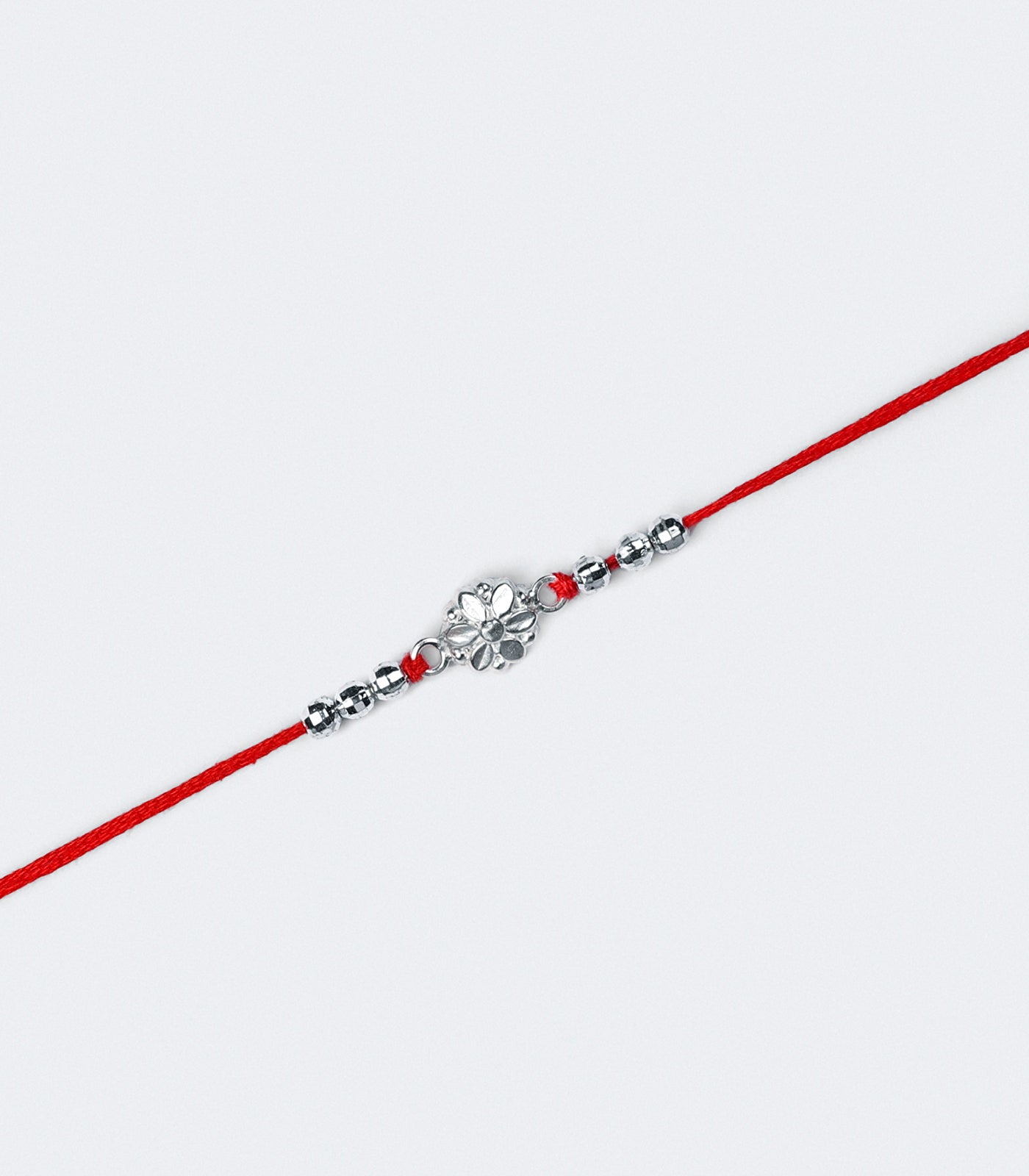 Silver Sacred Floral Rakhi