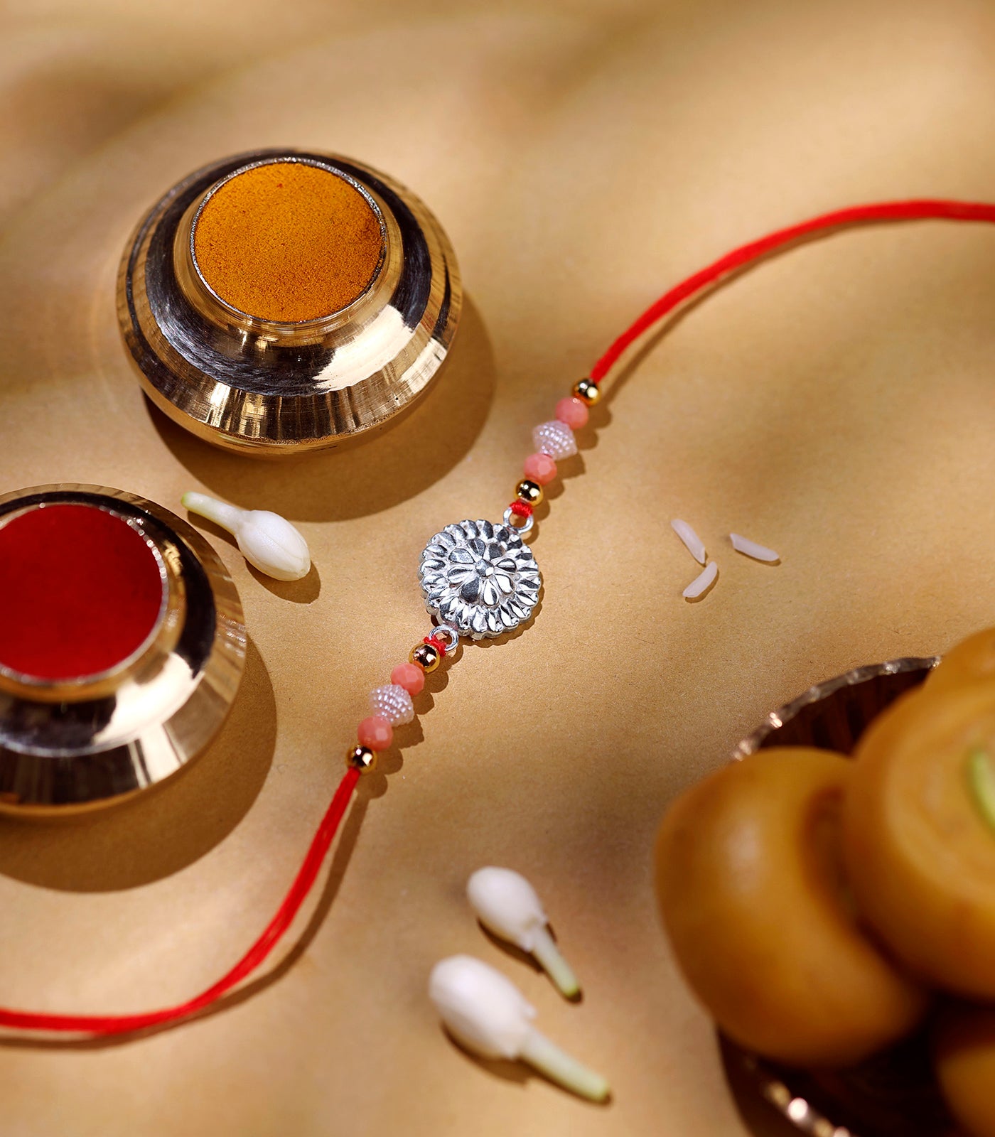 Silver Floral Wheel Rakhi