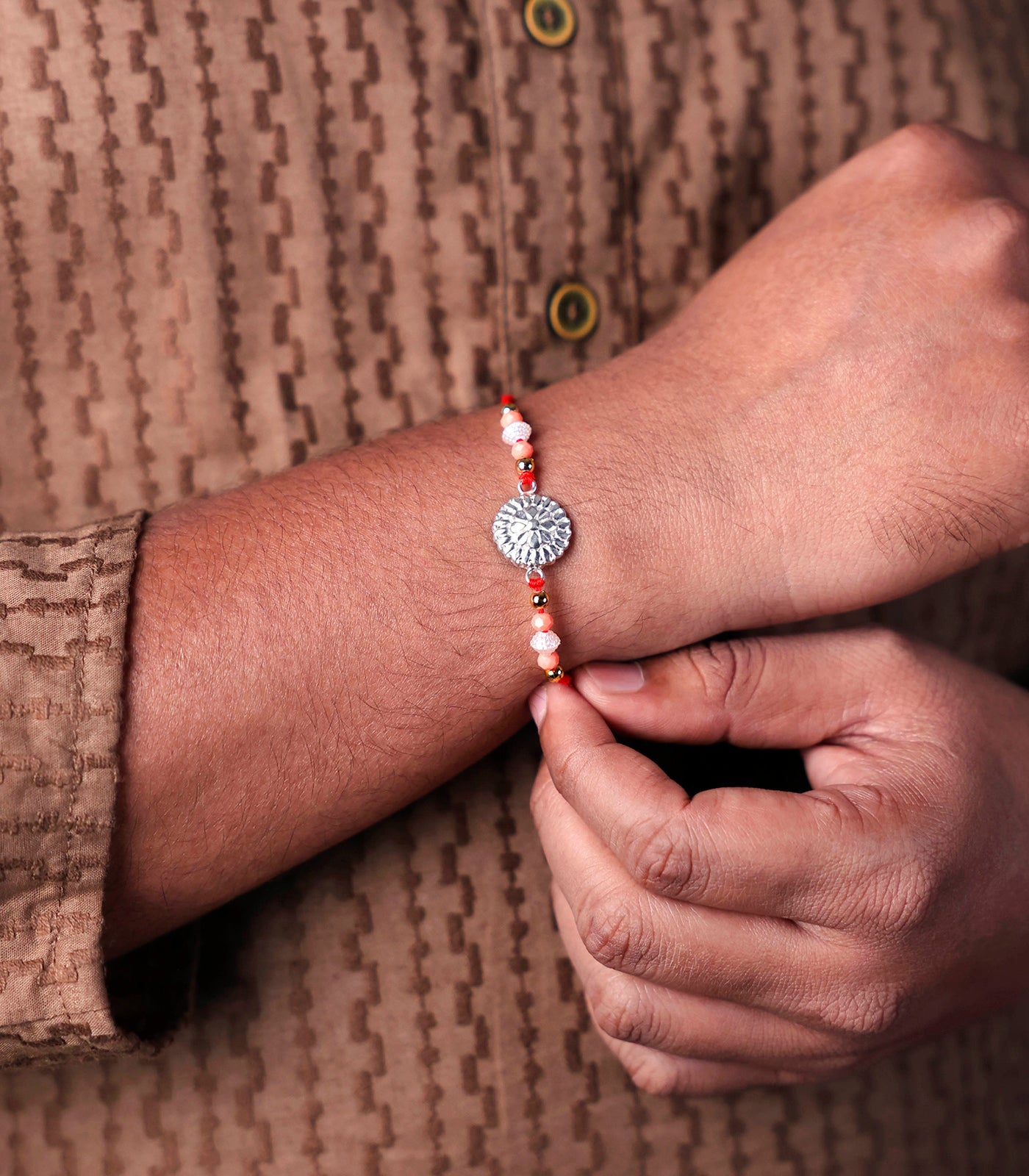 Silver Floral Wheel Rakhi