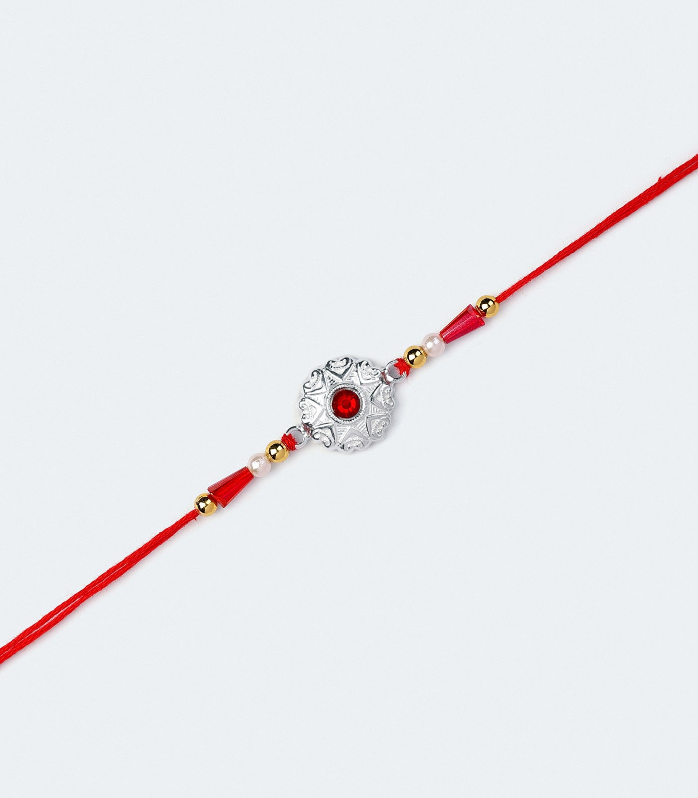 Silver Star Shaped Red Stone Rakhi