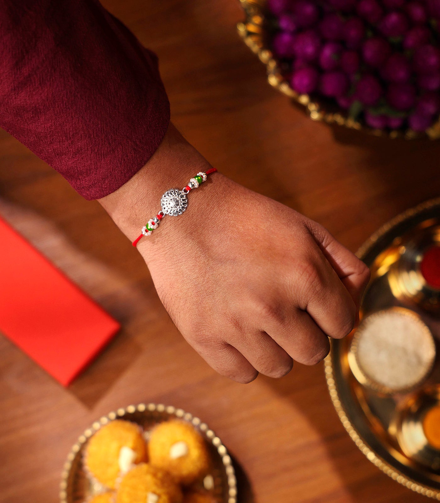 Silver Intricate Flower Rakhi