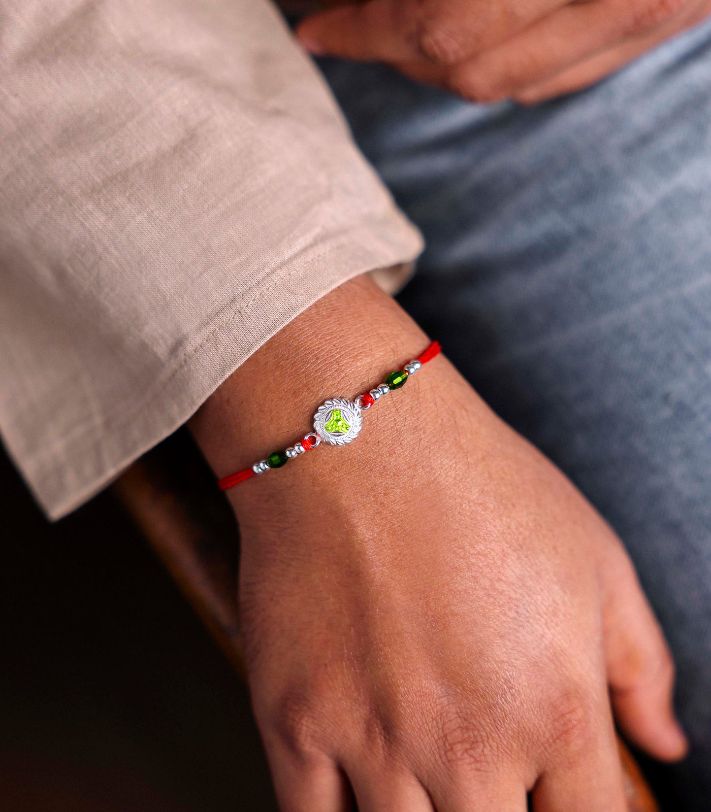 Silver Fluorescent Chakra Rakhi