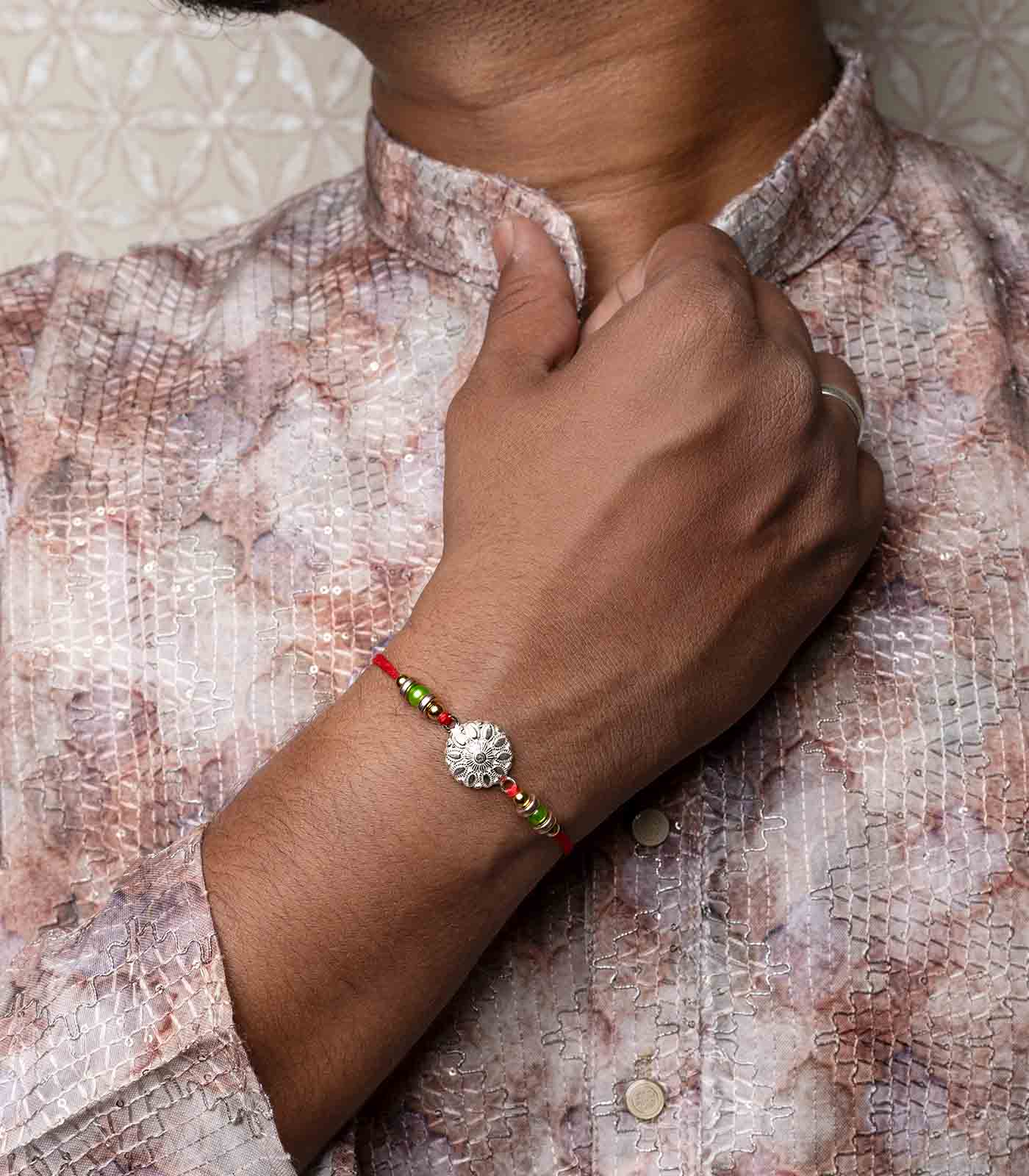 Silver Petal Motif Rakhi