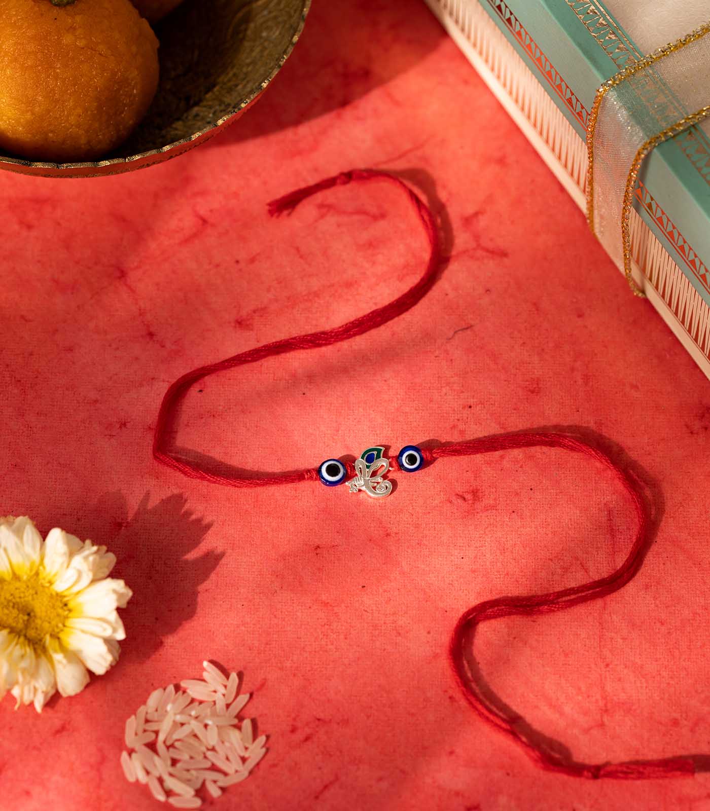 Silver Evil Eye Peacock Feather Rakhi