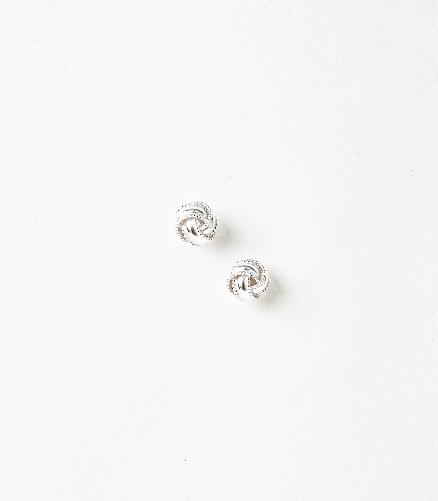 Interlocked Round Orbits Dual Silver Tops