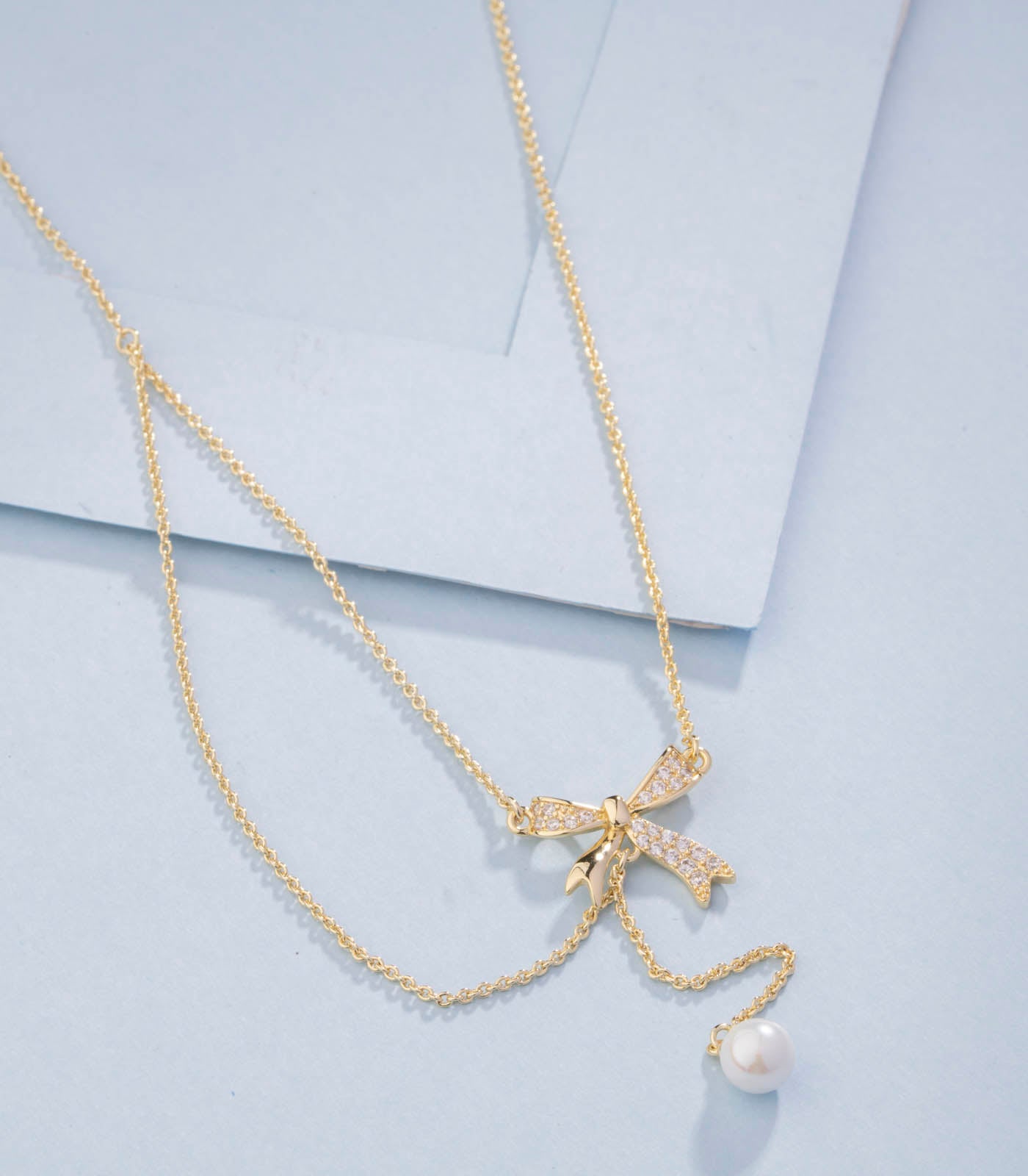 Ribbon pearl chain pendant (Brass)