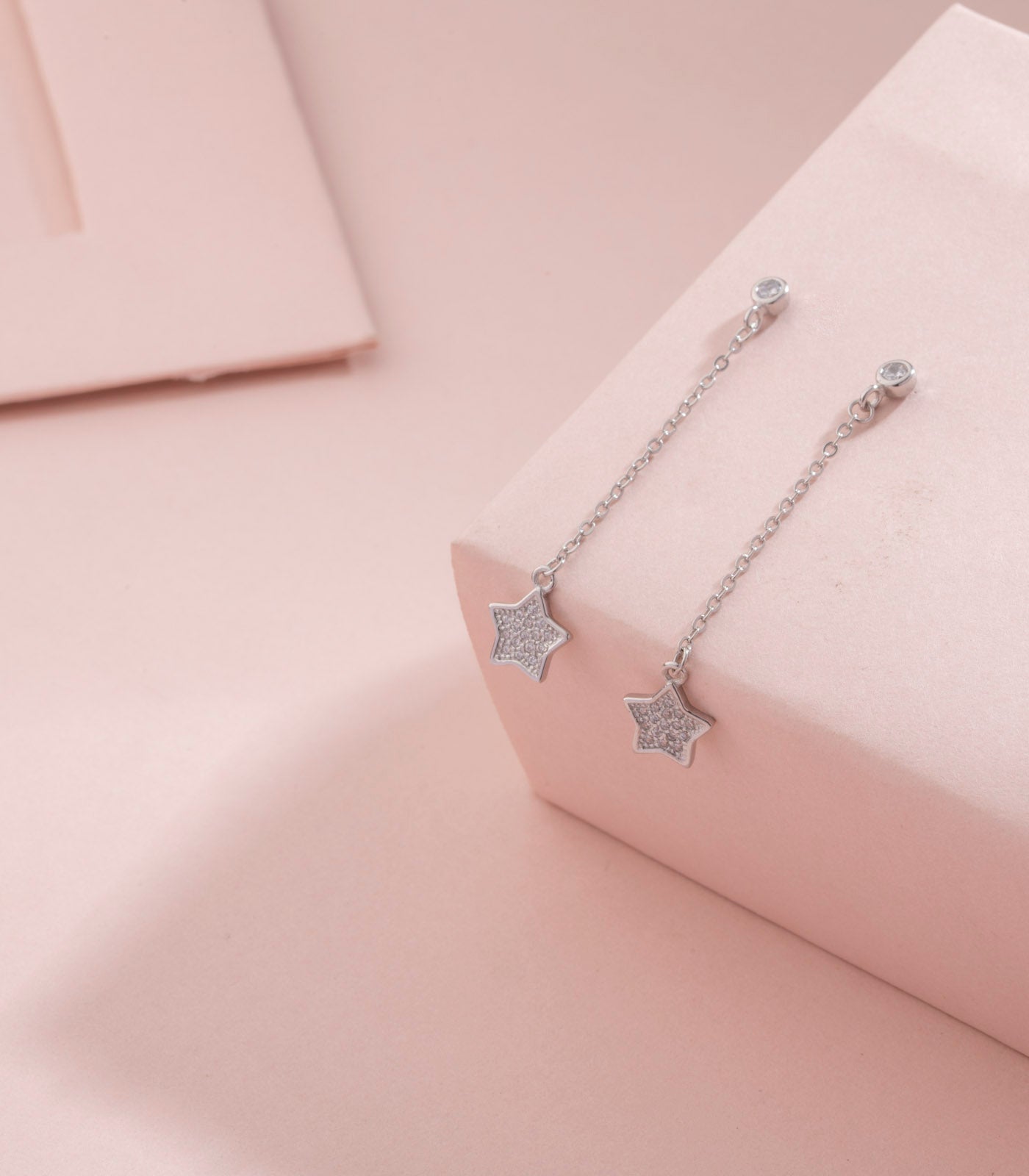 Silver twinkling star earrings (Silver)