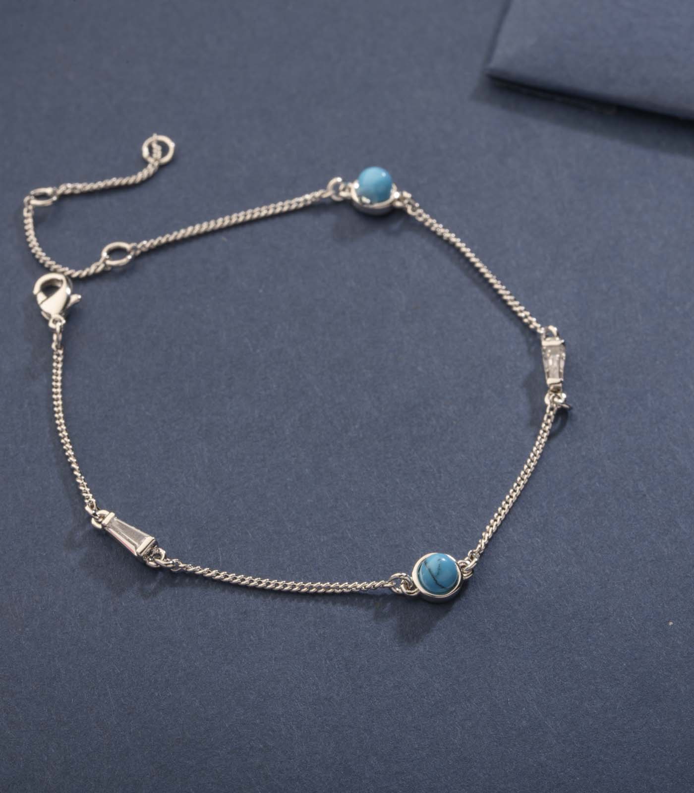 Sophisticated Silver String Of Blue Dots Bracelet (Brass)